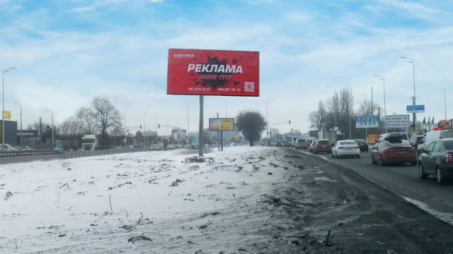 Призма 6x3,  Кільцева дорога (авторинок Автоцентр Жуляни, Бджілка маркет, АЗС Shell, ТЦ Аракс, Епіцентр, МЕТРО, ТРЦ РЕСПУБЛІКА), на розподілювачі, 1 км після Жулянського мосту, в напрямку станціі метро Теремки